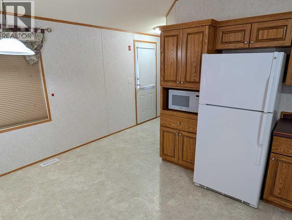 211 Railway Avenue, Coaldale, Alberta  T1M 0A8 - Photo 6 - A2295784