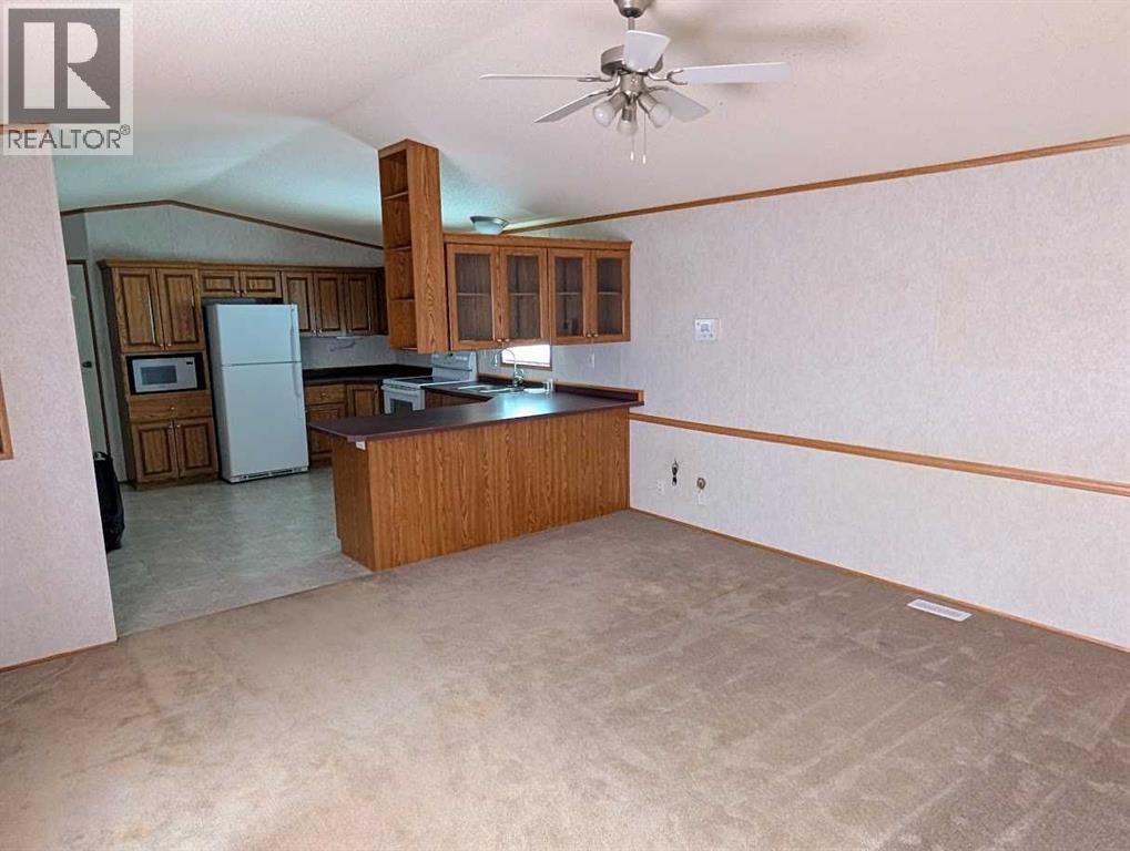 211 Railway Avenue, Coaldale, Alberta  T1M 0A8 - Photo 2 - A2295784