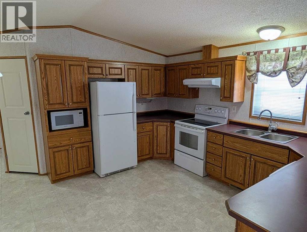 211 Railway Avenue, Coaldale, Alberta  T1M 0A8 - Photo 4 - A2295784