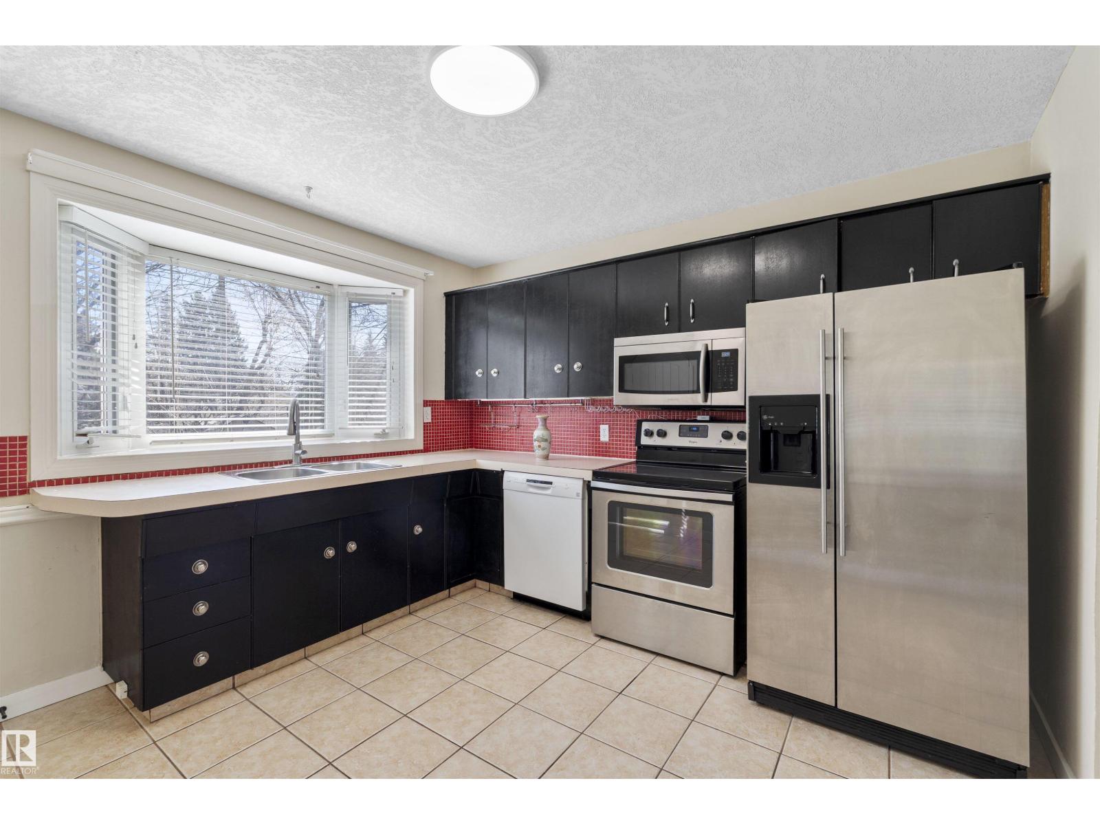 10715 135 St Nw, Edmonton, Alberta  T5M 1J7 - Photo 6 - E4483723