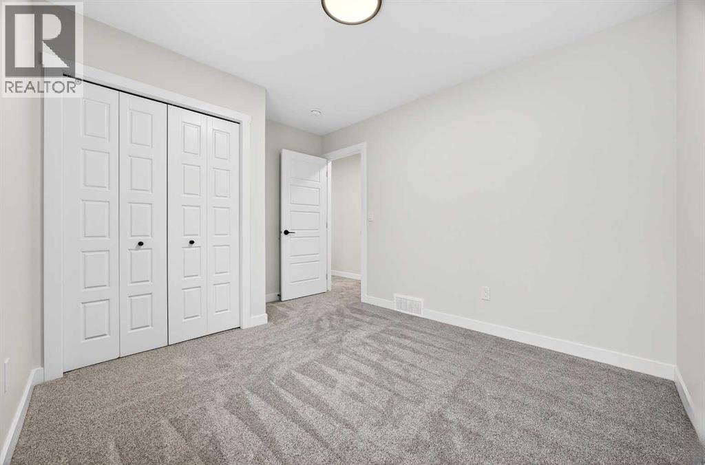 306 Alpine Boulevard, Calgary, Alberta  T2Y 0Y4 - Photo 37 - A2270684