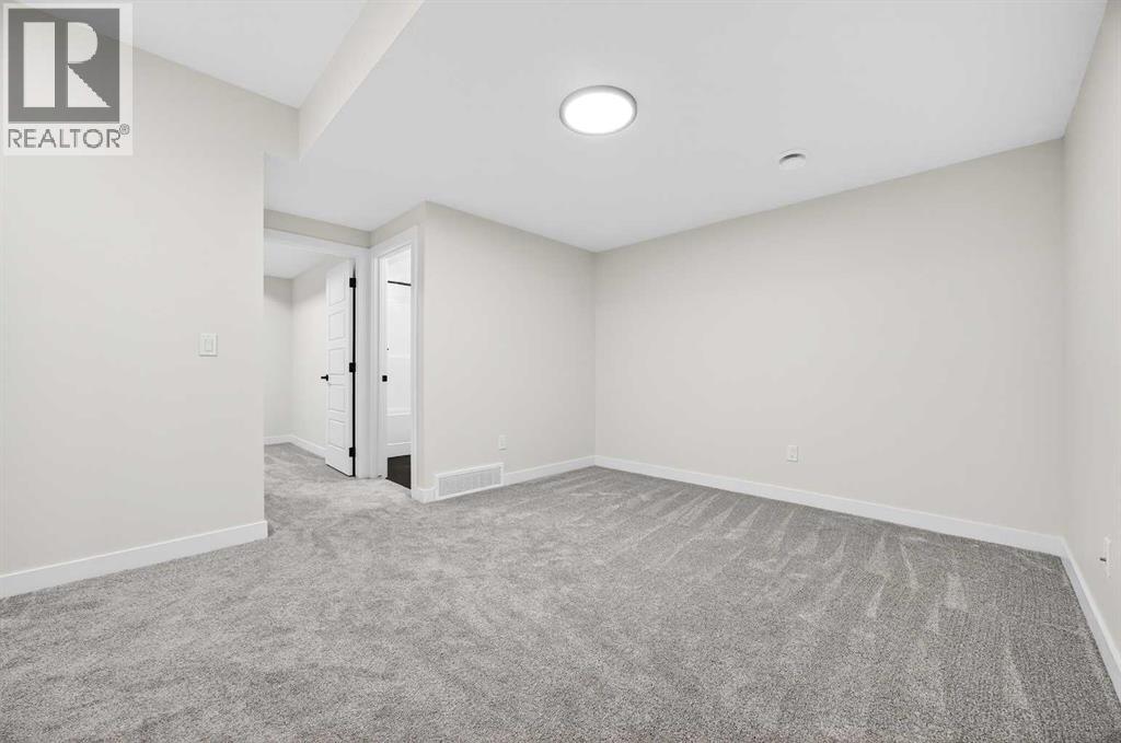 306 Alpine Boulevard, Calgary, Alberta  T2Y 0Y4 - Photo 42 - A2270684