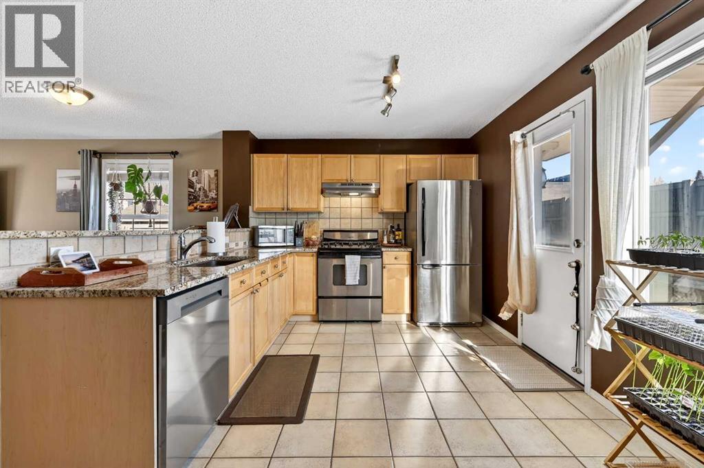 123 Tuscany Springs Gardens Nw, Calgary, Alberta  T3L 2R4 - Photo 13 - A2301647