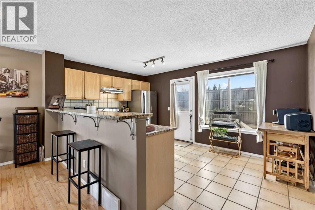 123 Tuscany Springs Gardens Nw, Calgary, Alberta  T3L 2R4 - Photo 10 - A2301647