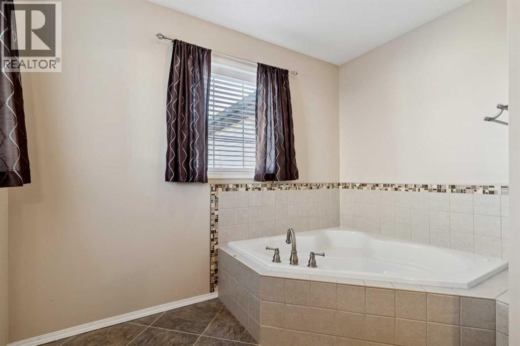 184 Cimarron Park Circle, Okotoks, Alberta  T1S 2H5 - Photo 24 - A2302054