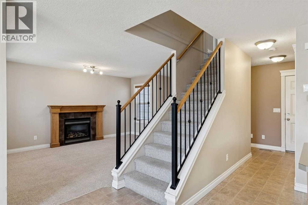 184 Cimarron Park Circle, Okotoks, Alberta  T1S 2H5 - Photo 7 - A2302054