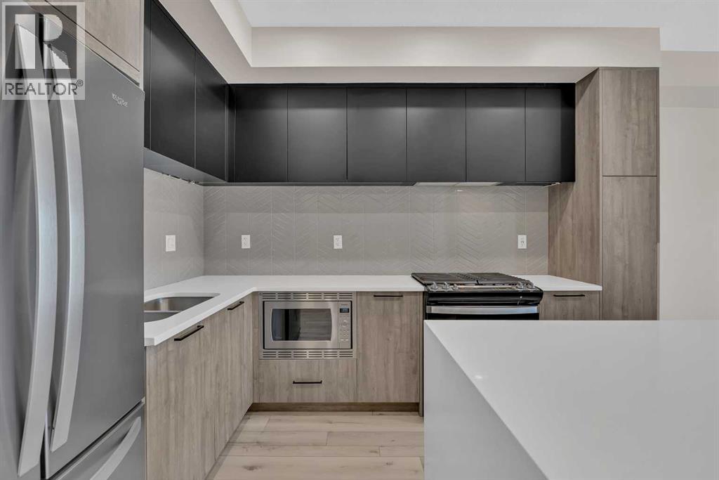 310, 4160 Norford Avenue Nw, Calgary, Alberta  T3B 6L8 - Photo 4 - A2301585