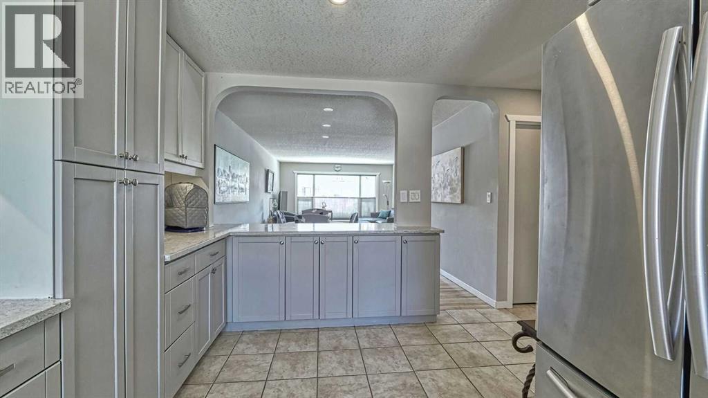 64 Midglen Drive Se, Calgary, Alberta  T2X 1G7 - Photo 11 - A2302754