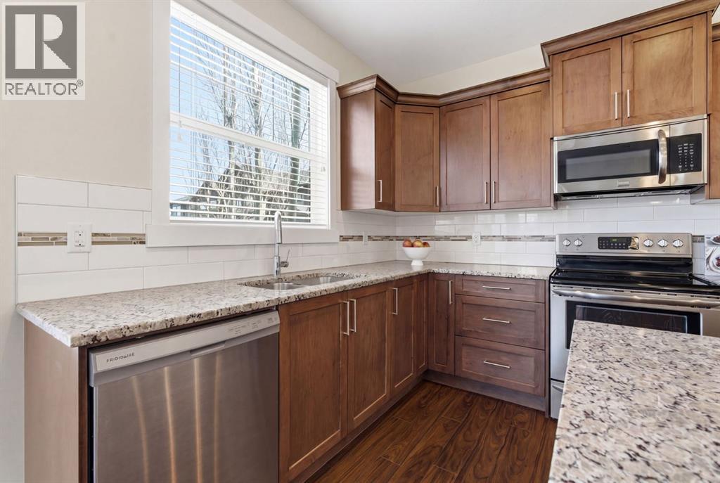 403, 110 Coopers Common SW, Airdrie, Alberta  T4B 3Y3 - Photo 6 - A2303776