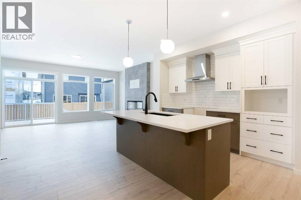 53 Creekside Passage SW, Calgary, Alberta  T2X 5V6 - Photo 5 - A2279223