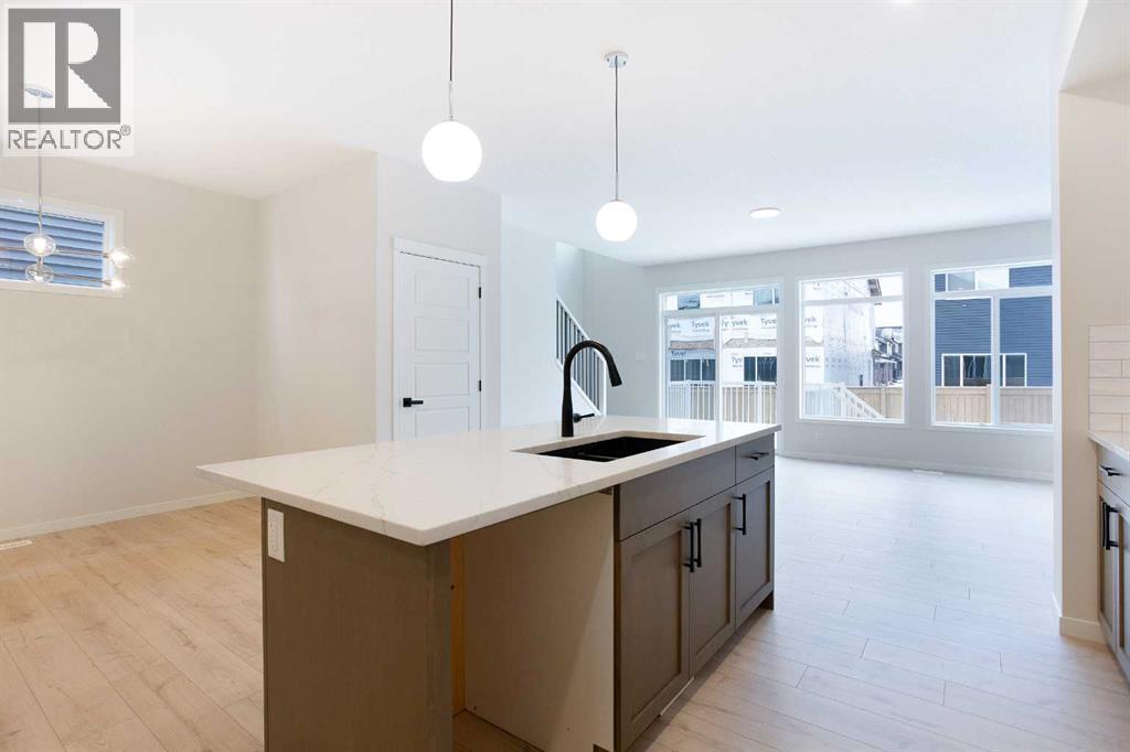 53 Creekside Passage SW, Calgary, Alberta  T2X 5V6 - Photo 10 - A2279223