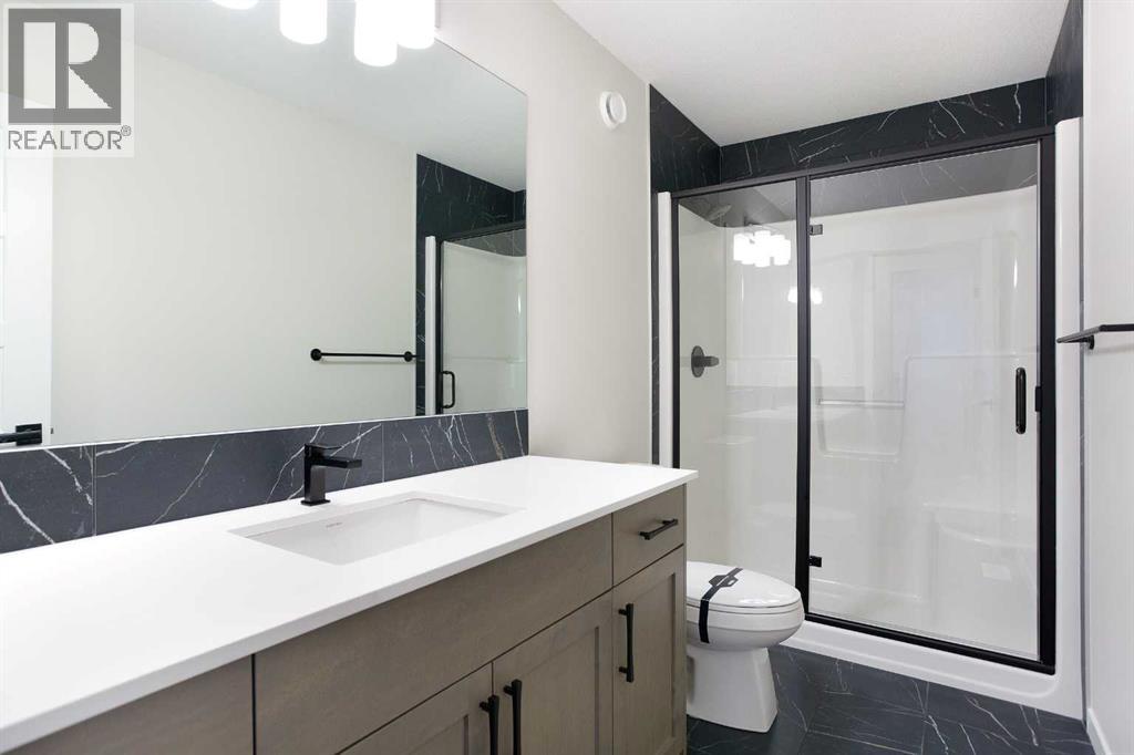 53 Creekside Passage SW, Calgary, Alberta  T2X 5V6 - Photo 28 - A2279223