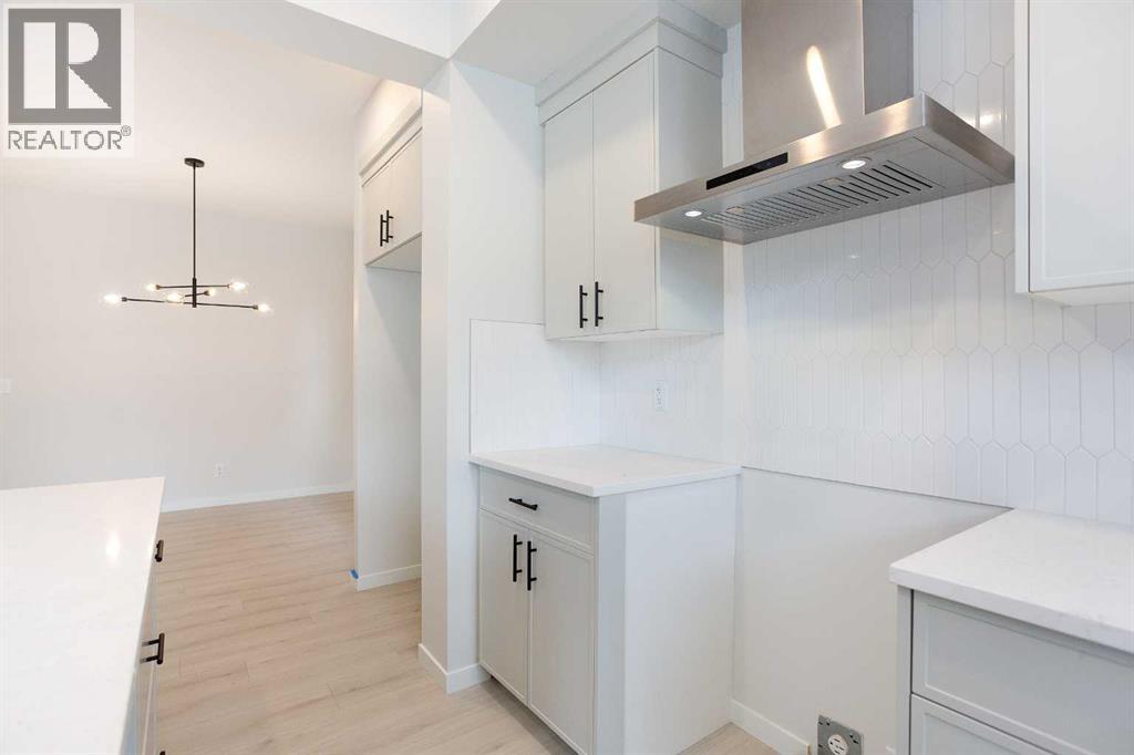 49 Creekside Passage SW, Calgary, Alberta  T2X 5V6 - Photo 7 - A2279243