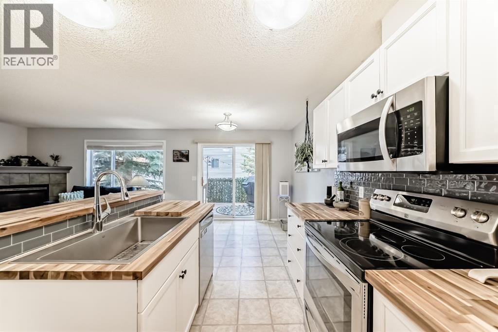 8, 122 Bow Ridge Crescent, Cochrane, Alberta  T4C 1V9 - Photo 6 - A2278590