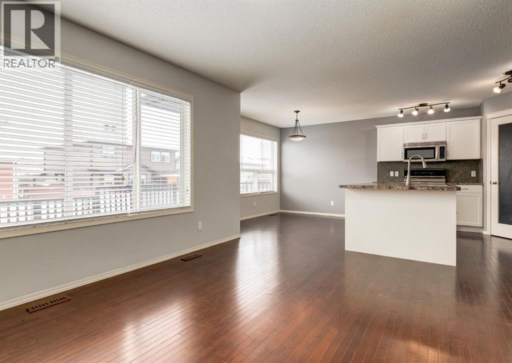 113 Luxstone Green SW, Airdrie, Alberta  T4B 3B9 - Photo 4 - A2294849