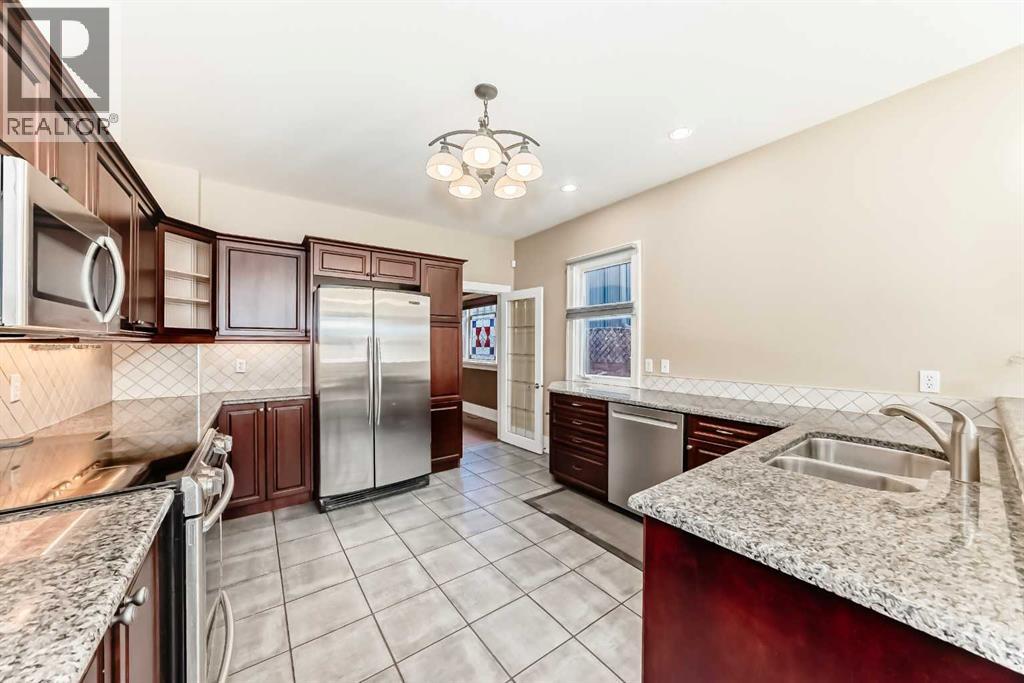 452 13 Street NW, Calgary, Alberta  T2N 1Z2 - Photo 6 - A2294833