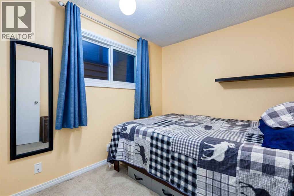4 Cedarbrook Way Sw, Calgary, Alberta  T2W 3Y3 - Photo 15 - A2301727