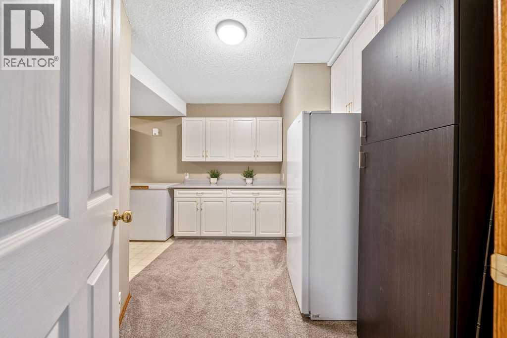 149 West Terrace Crescent, Cochrane, Alberta  T4C 1R3 - Photo 32 - A2298502