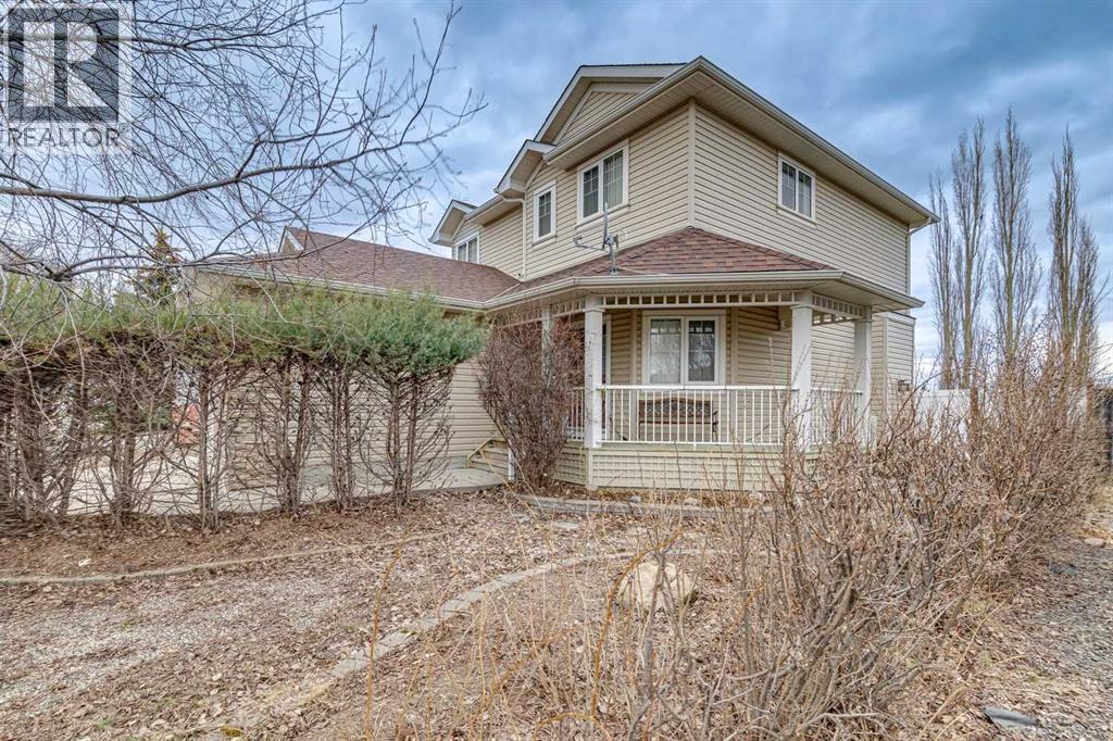 37 Cimarron Trail, Okotoks, Alberta  T1S 1V8 - Photo 4 - A2302223