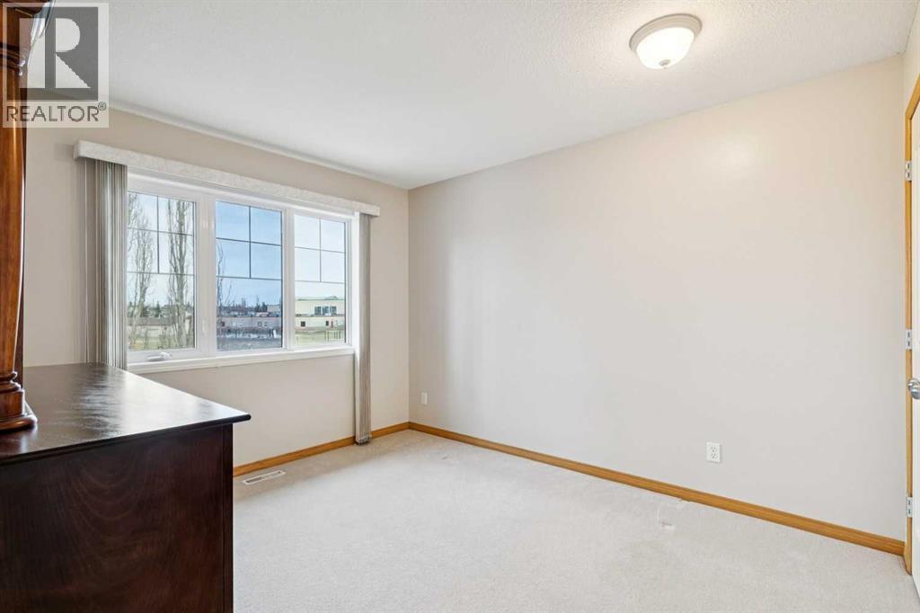 37 Cimarron Trail, Okotoks, Alberta  T1S 1V8 - Photo 32 - A2302223