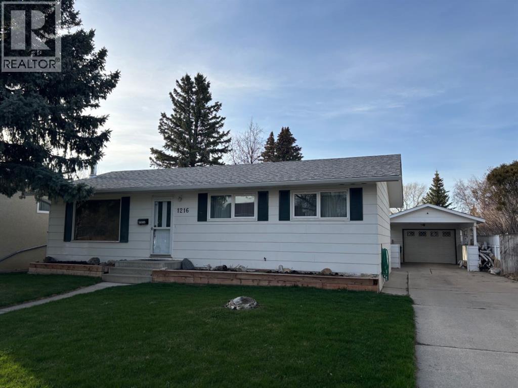1216 Lakemount Boulevard S, Lethbridge, Alberta  T1K 3K1 - Photo 1 - A2304431
