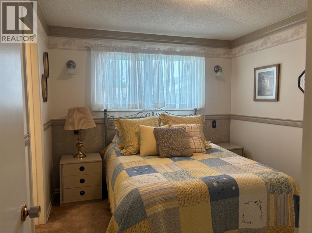 1216 Lakemount Boulevard S, Lethbridge, Alberta  T1K 3K1 - Photo 11 - A2304431