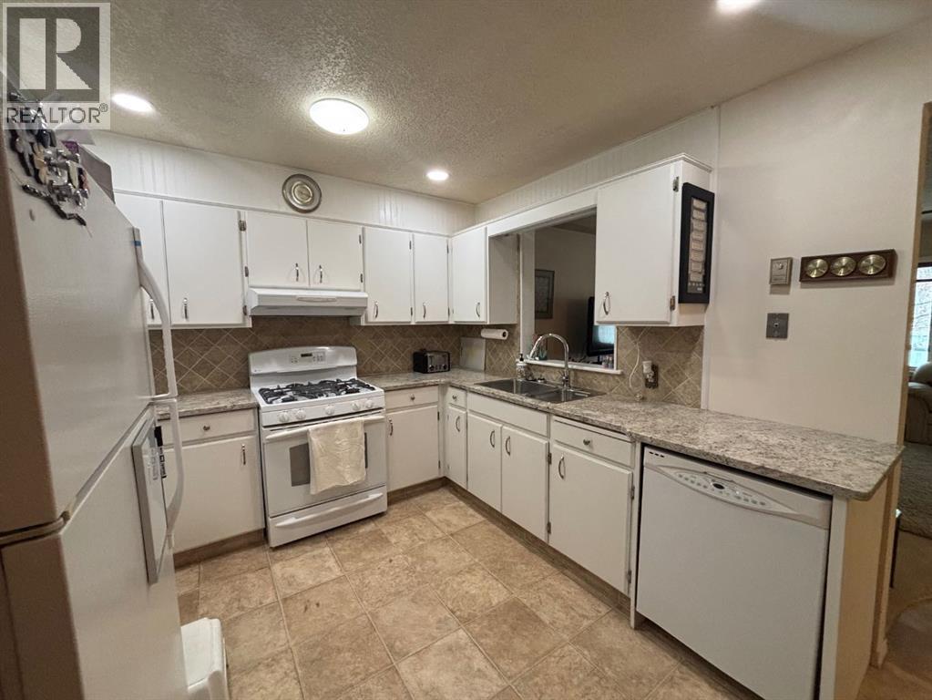 1216 Lakemount Boulevard S, Lethbridge, Alberta  T1K 3K1 - Photo 13 - A2304431