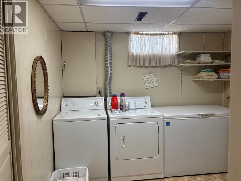 1216 Lakemount Boulevard S, Lethbridge, Alberta  T1K 3K1 - Photo 34 - A2304431