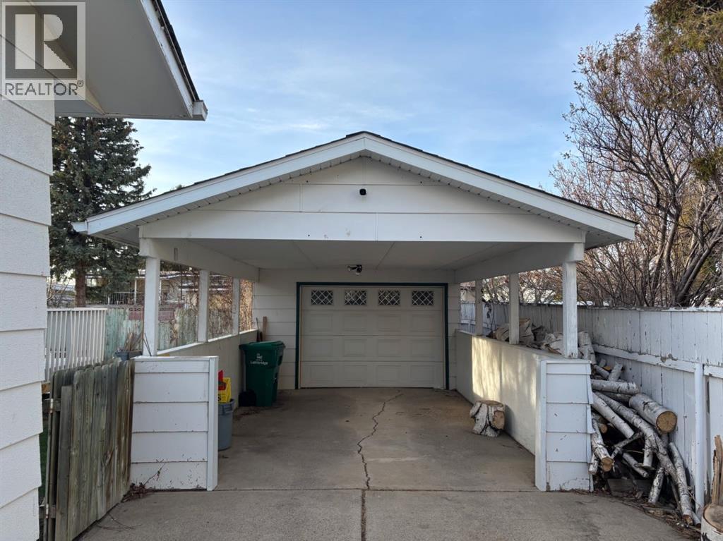 1216 Lakemount Boulevard S, Lethbridge, Alberta  T1K 3K1 - Photo 37 - A2304431