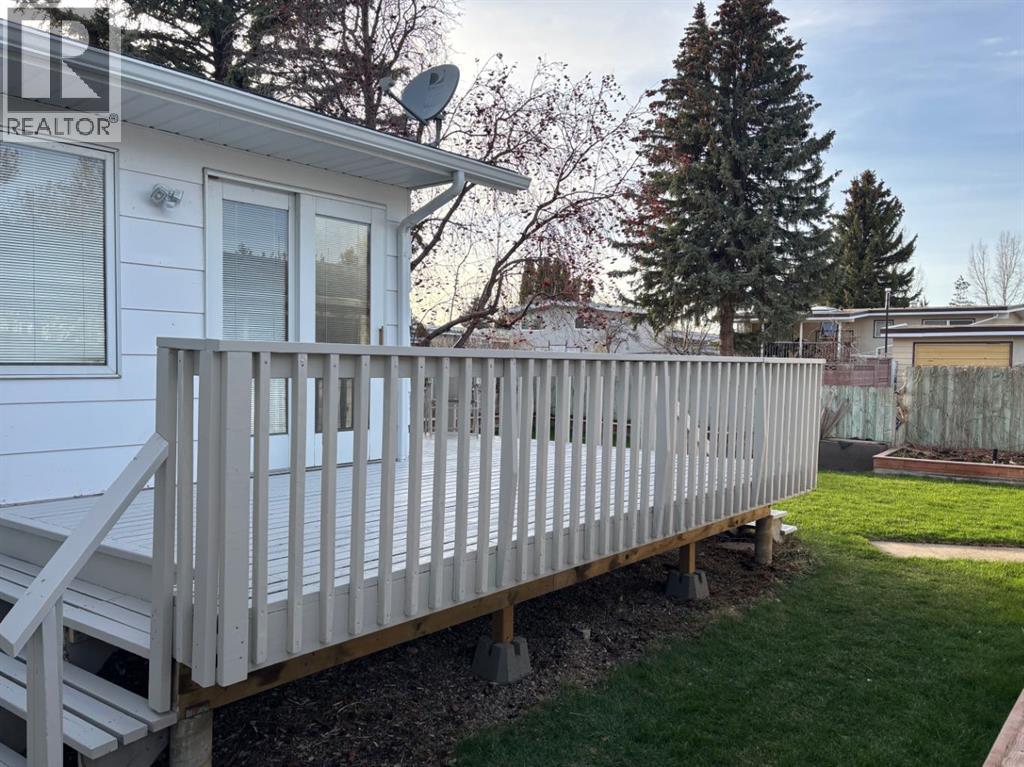 1216 Lakemount Boulevard S, Lethbridge, Alberta  T1K 3K1 - Photo 39 - A2304431