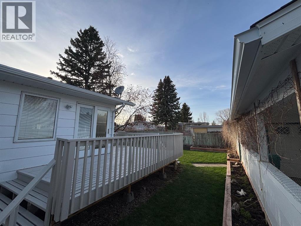 1216 Lakemount Boulevard S, Lethbridge, Alberta  T1K 3K1 - Photo 44 - A2304431