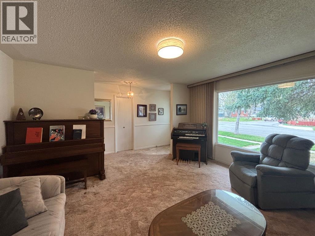 1216 Lakemount Boulevard S, Lethbridge, Alberta  T1K 3K1 - Photo 8 - A2304431