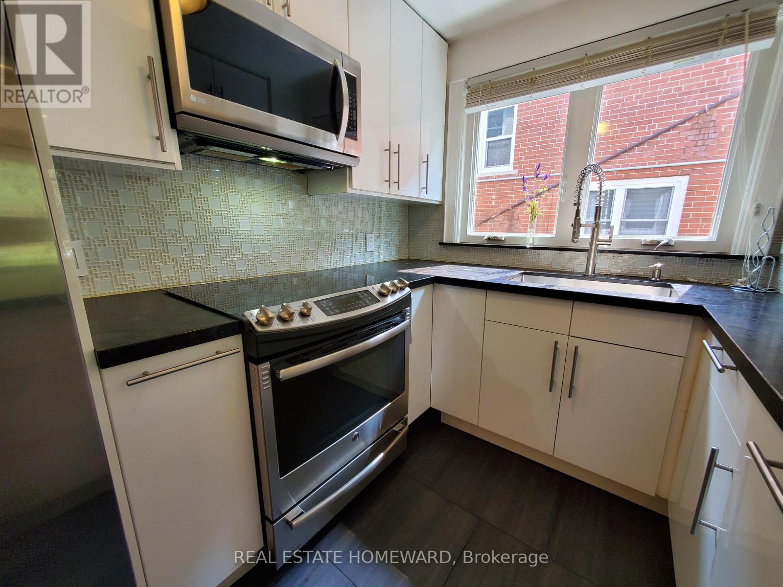 Main Floor - 21 Love Crescent, Toronto, Ontario  M4E 1V6 - Photo 6 - E12825162