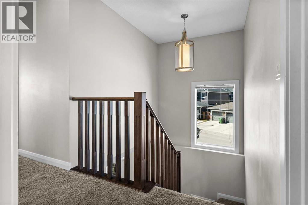 100 Kinniburgh Gardens, Chestermere, Alberta  T1X 0R8 - Photo 21 - A2302807