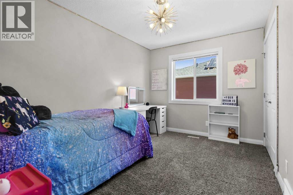 100 Kinniburgh Gardens, Chestermere, Alberta  T1X 0R8 - Photo 32 - A2302807