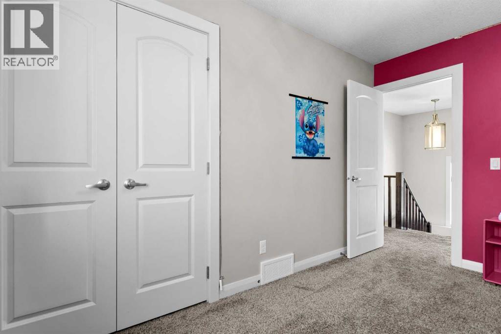 100 Kinniburgh Gardens, Chestermere, Alberta  T1X 0R8 - Photo 33 - A2302807