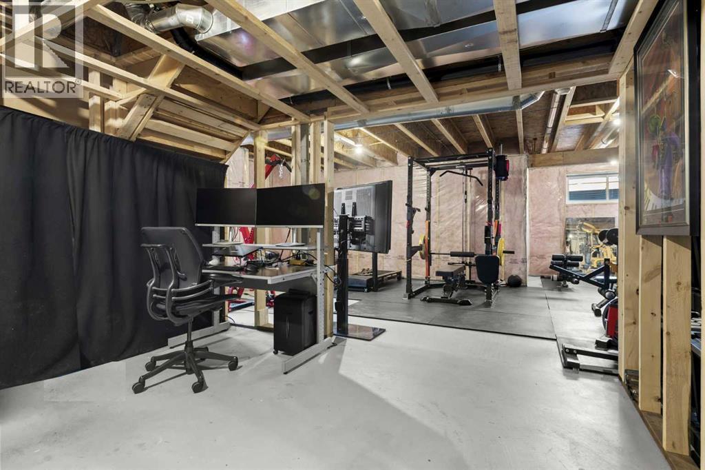 100 Kinniburgh Gardens, Chestermere, Alberta  T1X 0R8 - Photo 37 - A2302807