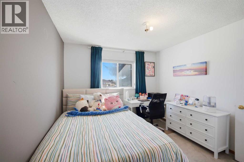 80 Martinglen Way Ne, Calgary, Alberta  T3J 3J1 - Photo 21 - A2301073