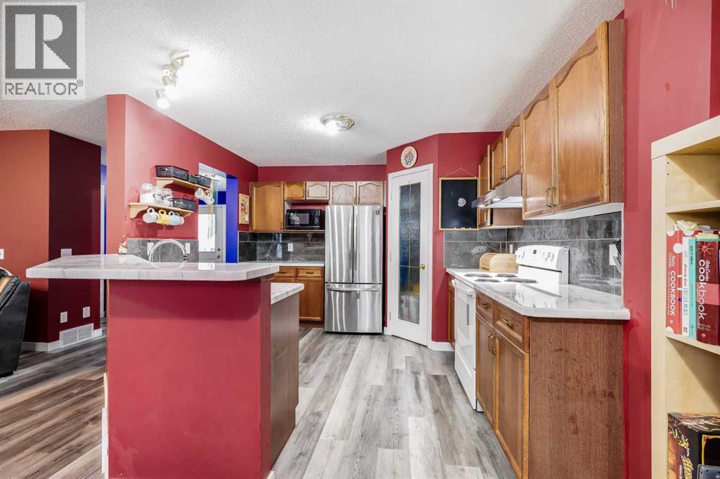 127 Woodside Crescent NW, Airdrie, Alberta  T4B 2K4 - Photo 11 - A2301636