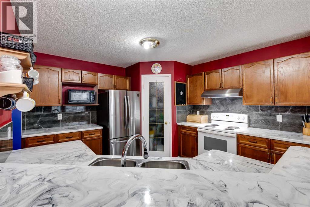 127 Woodside Crescent NW, Airdrie, Alberta  T4B 2K4 - Photo 13 - A2301636