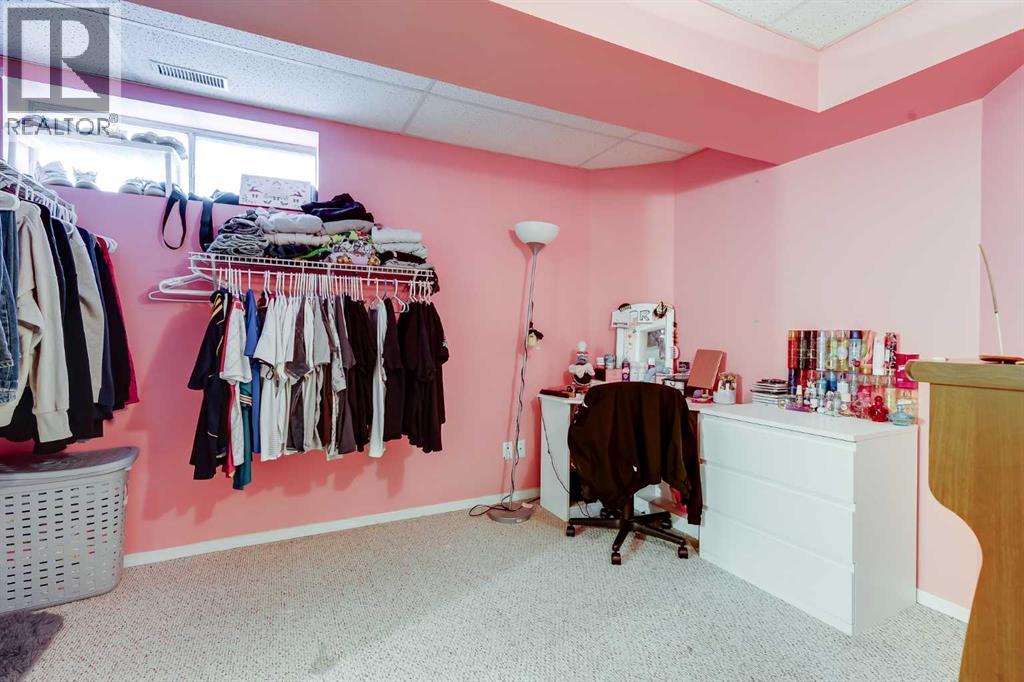 127 Woodside Crescent NW, Airdrie, Alberta  T4B 2K4 - Photo 32 - A2301636