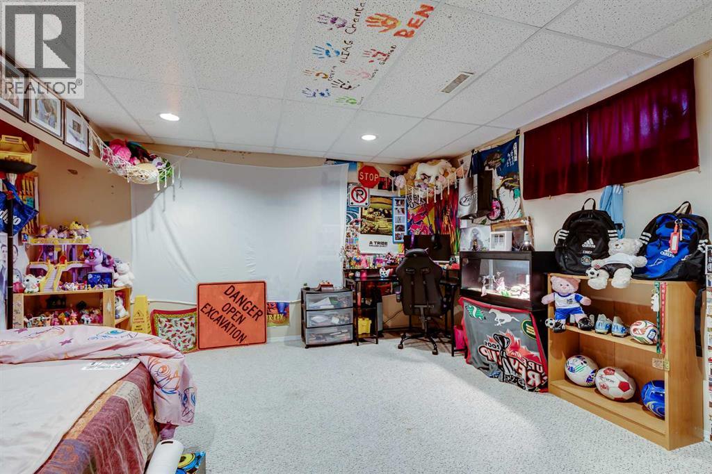 127 Woodside Crescent NW, Airdrie, Alberta  T4B 2K4 - Photo 30 - A2301636