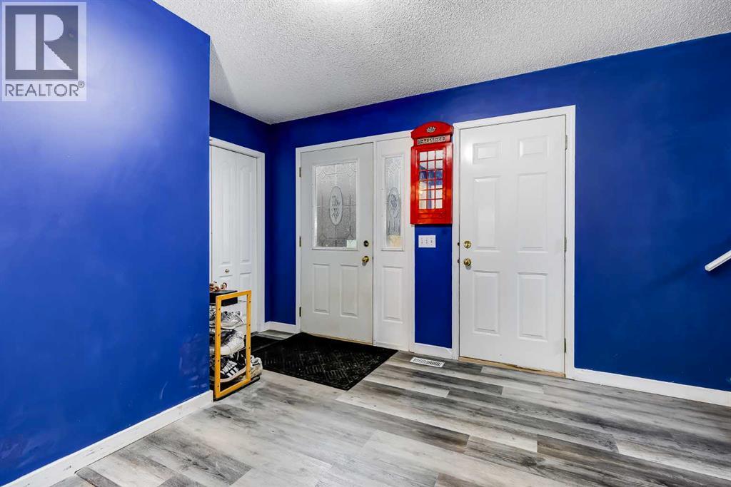 127 Woodside Crescent NW, Airdrie, Alberta  T4B 2K4 - Photo 3 - A2301636