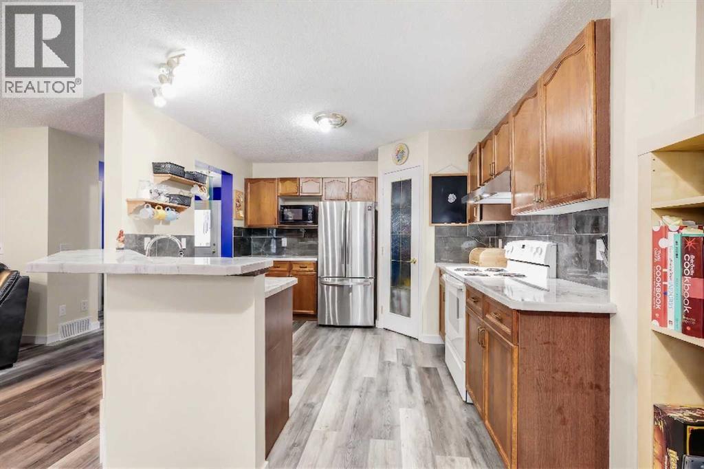 127 Woodside Crescent NW, Airdrie, Alberta  T4B 2K4 - Photo 12 - A2301636