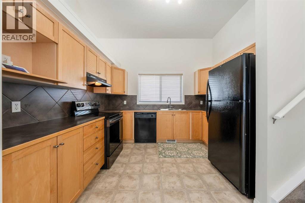 1211 Everridge Drive Sw, Calgary, Alberta  T2Y 4T2 - Photo 10 - A2302634