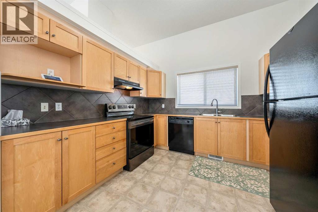 1211 Everridge Drive Sw, Calgary, Alberta  T2Y 4T2 - Photo 11 - A2302634