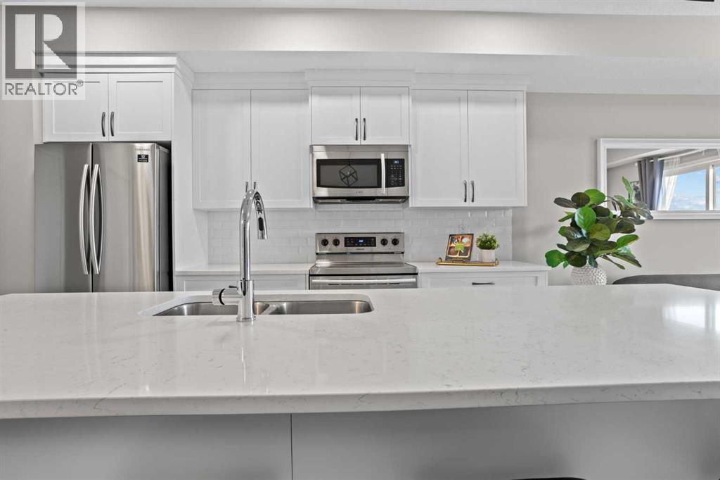 406, 370 Harvest Hills Common NE, Calgary, Alberta  T3K 2M8 - Photo 9 - A2285239