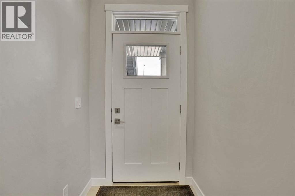 149 Belmont Villas SW, Calgary, Alberta  T2X 4W7 - Photo 3 - A2300649