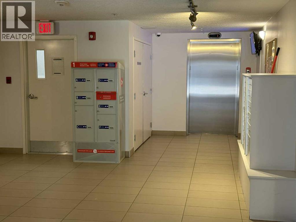 1403, 175 Panatella Hill NW, Calgary, Alberta  T3K 0V9 - Photo 3 - A2286350