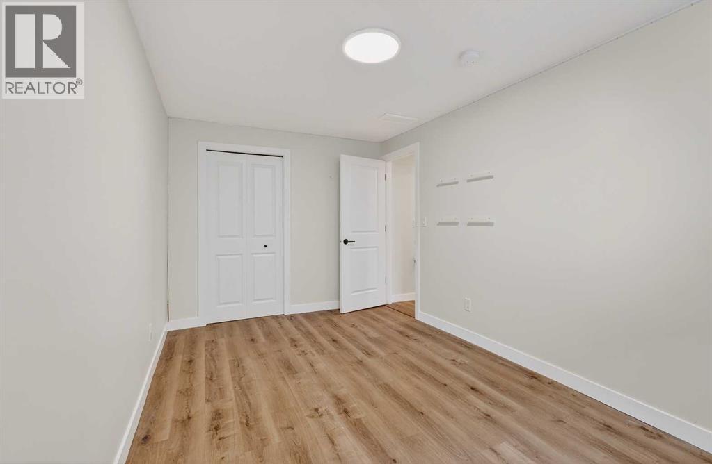 584 Woodhill Place Sw, Calgary, Alberta  T2W 3L5 - Photo 36 - A2298867